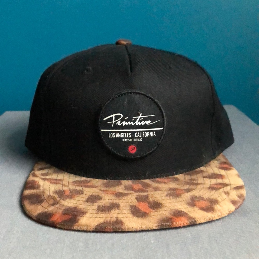 Primitive black and leopard print hat